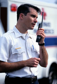 Picture of emergency response personnel placing a call