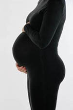 Picture of expectant mother holding her belly