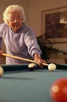 Picture of an elderly woman at a billiards table