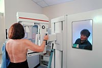 Photo of a woman having a mammogram