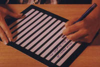 Picture of a large-scale writing tablet for the visually impaired