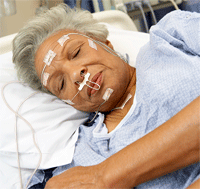 Photograph of a woman undergoing a sleep study