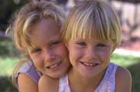 Picture of two young girls, giggling